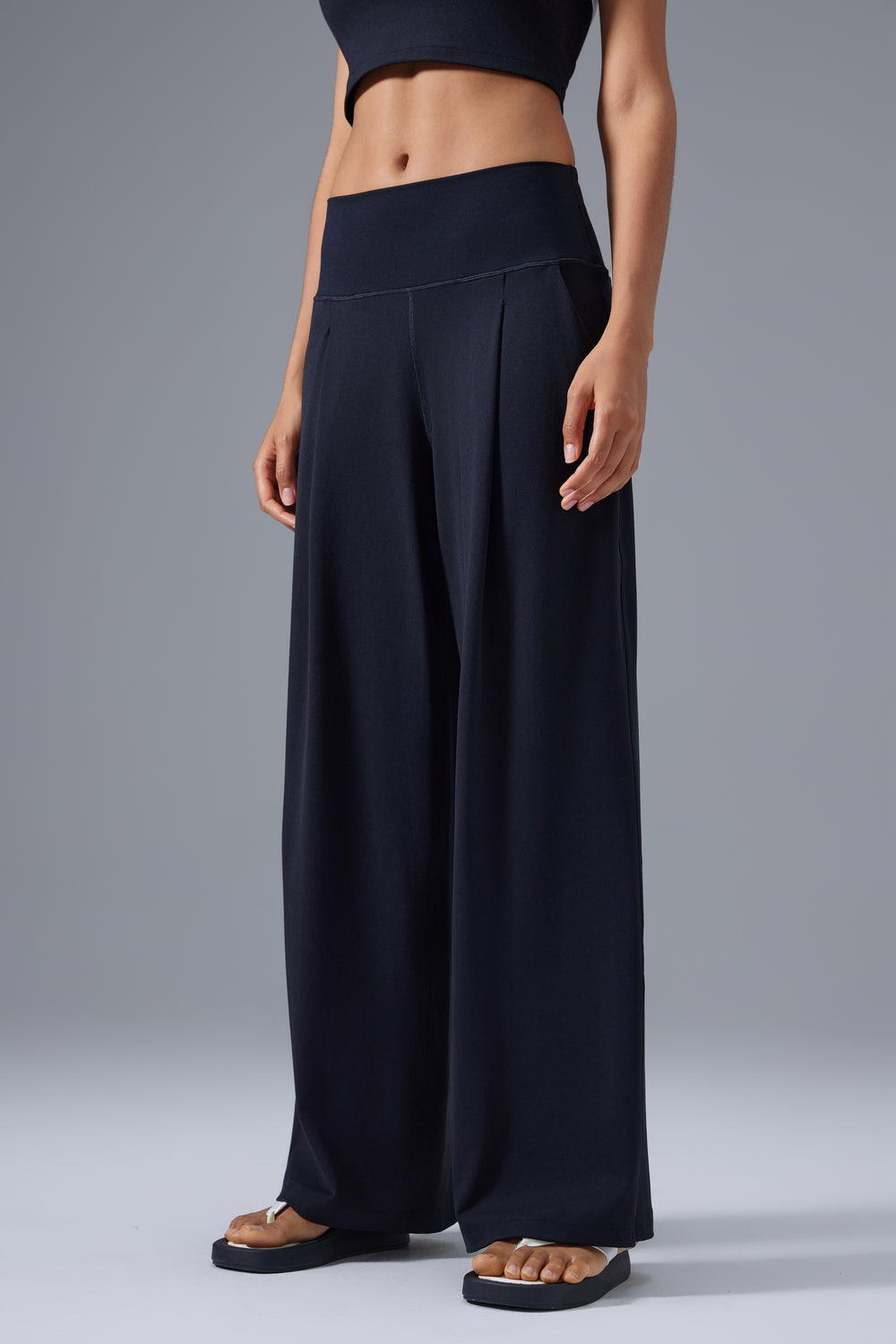 black soft stretch pants women chic workwear front view